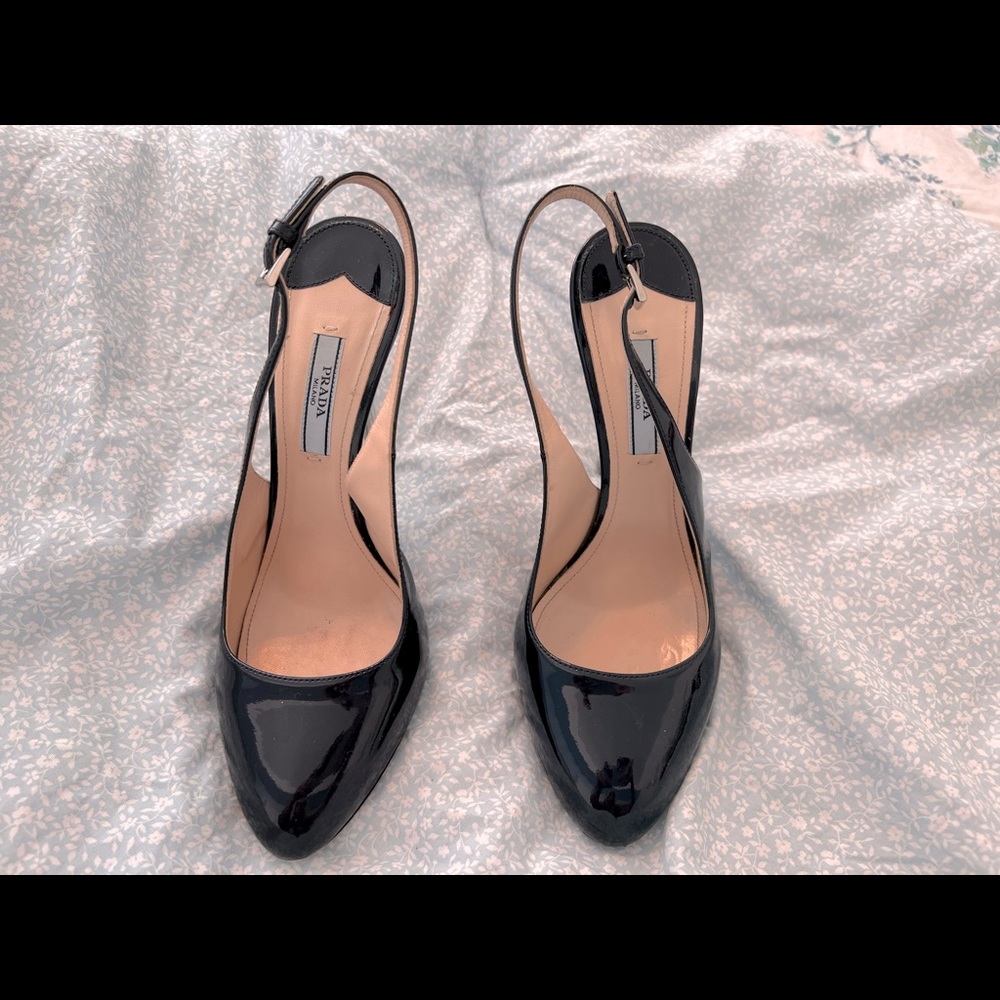 Stunning navy patent leather Prada sling backs!